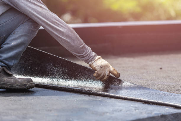 Professional Waterproofing technician working in Rochester, WI